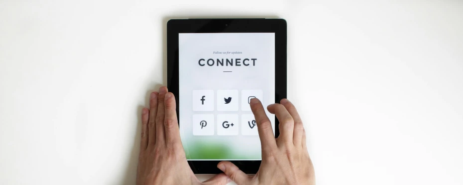 person using black iPad